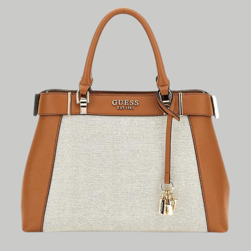 Brown and beige handbag with Guess logo on a gray background