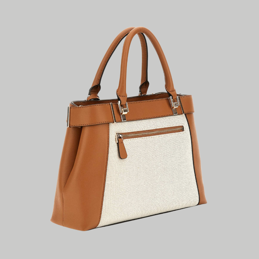 Brown and beige handbag on a gray background